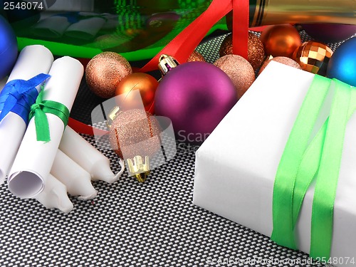 Image of Christmas gift box with decoration