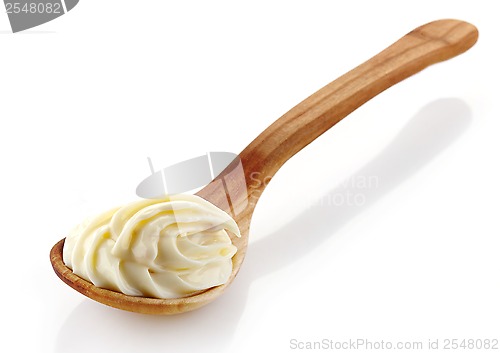 Image of wooden spoon with cream cheese