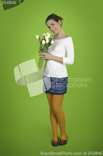 Image of Happy girl with tulips