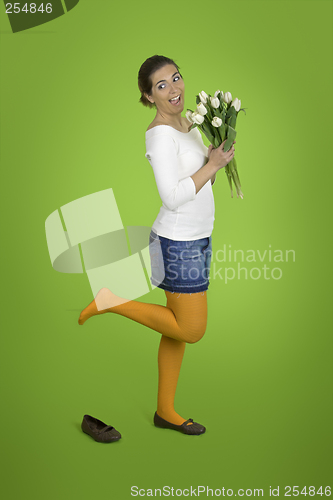 Image of Happy girl with tulips