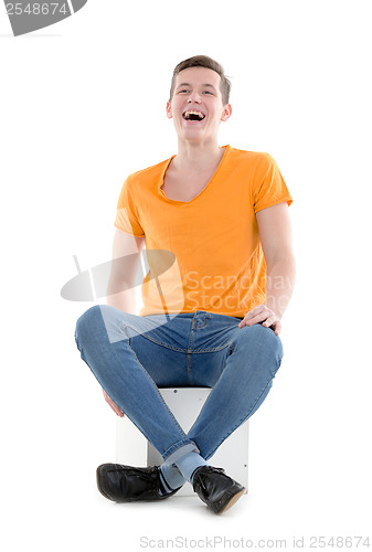 Image of Young man laughing out loud, on white background