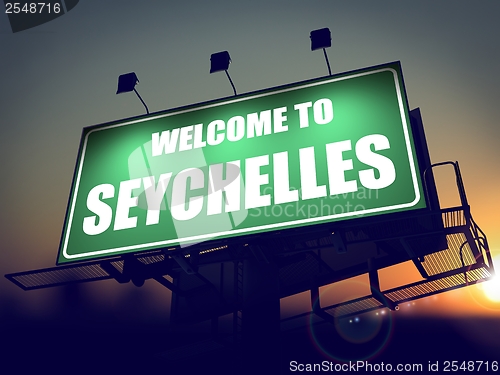 Image of Billboard Welcome to Seychelles at Sunrise.