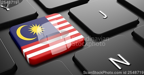 Image of Malaysia - Flag on Button of Black Keyboard.