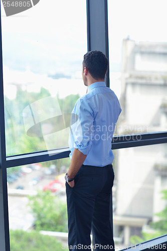 Image of business man talking by cellphone
