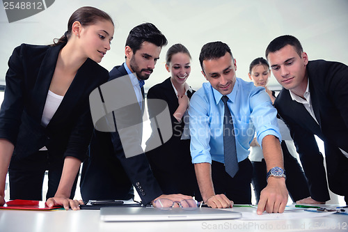 Image of business people group in a meeting at office