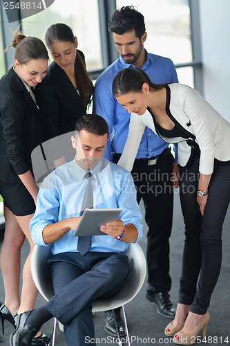 Image of business people group in a meeting at office