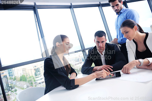 Image of business people group in a meeting at office