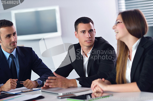 Image of business people group in a meeting at office