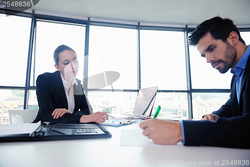 Image of business people group in a meeting at office