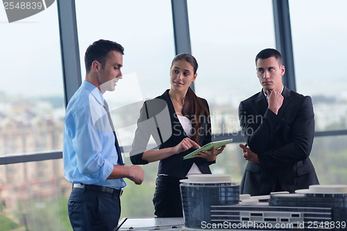 Image of business people and engineers on meeting