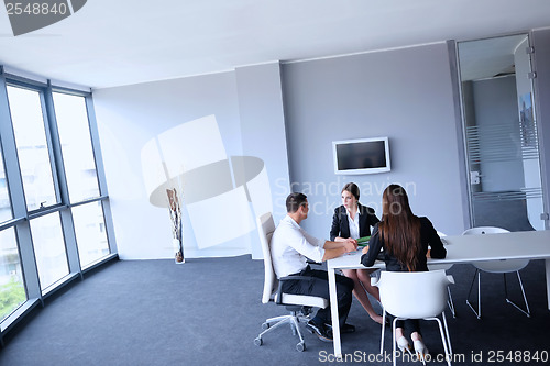 Image of business people group in a meeting at office
