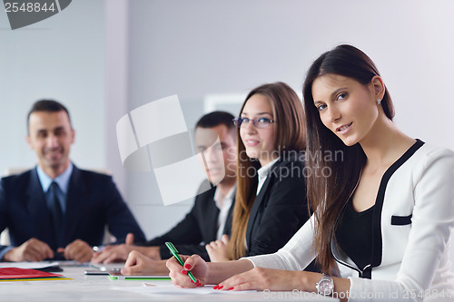 Image of business people group in a meeting at office