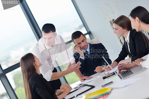 Image of business people group in a meeting at office