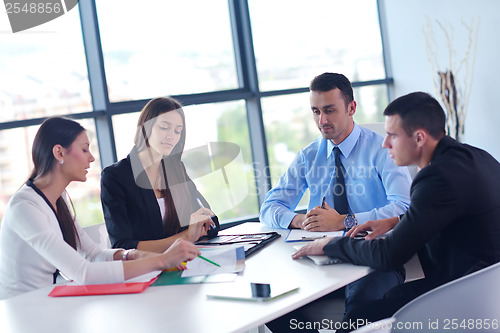 Image of business people group in a meeting at office