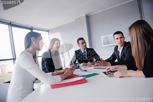 Image of business people group in a meeting at office
