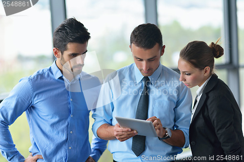 Image of business people group in a meeting at office