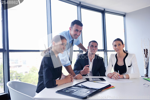 Image of business people group in a meeting at office
