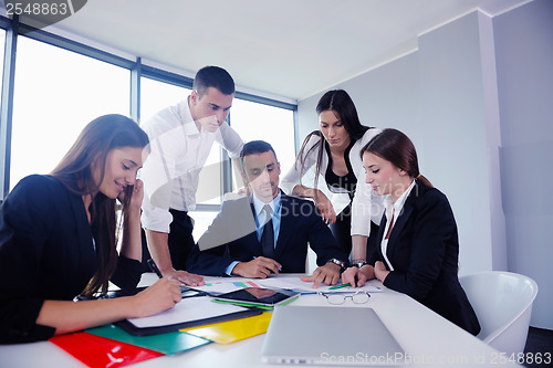 Image of business people group in a meeting at office