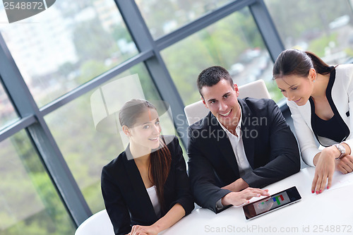 Image of business people group in a meeting at office