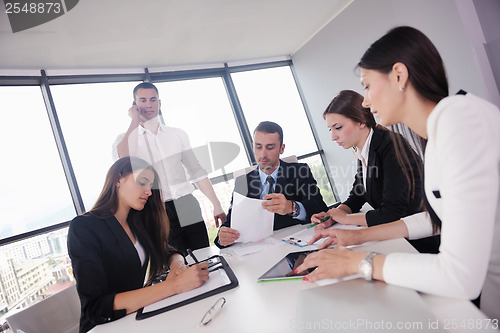 Image of business people group in a meeting at office