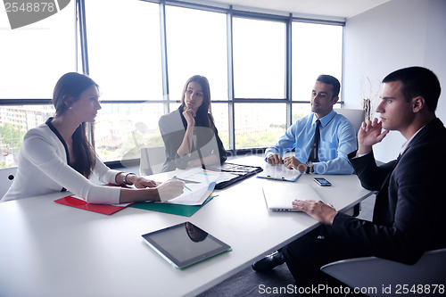 Image of business people group in a meeting at office