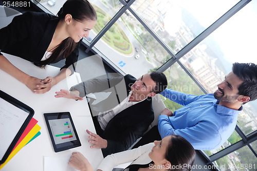 Image of business people group in a meeting at office