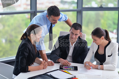 Image of business people group in a meeting at office