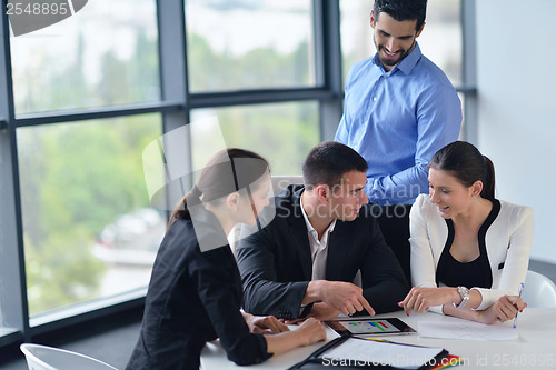 Image of business people group in a meeting at office
