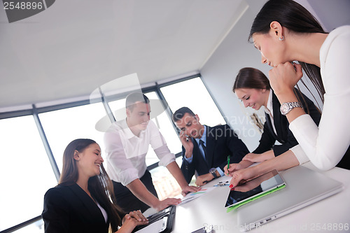 Image of business people group in a meeting at office