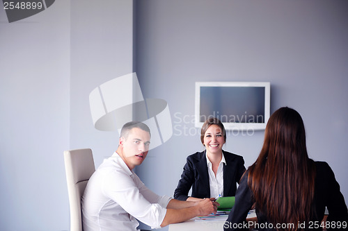 Image of business people group in a meeting at office