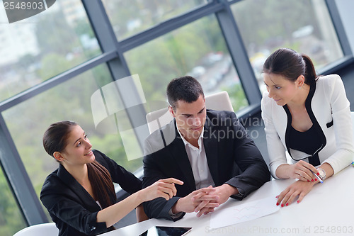 Image of business people group in a meeting at office
