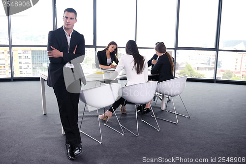 Image of business people group in a meeting at office