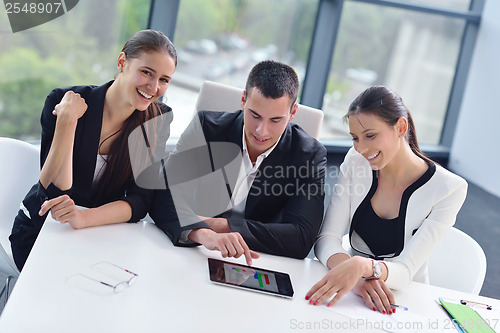 Image of business people group in a meeting at office