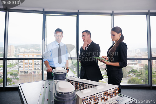 Image of business people and engineers on meeting