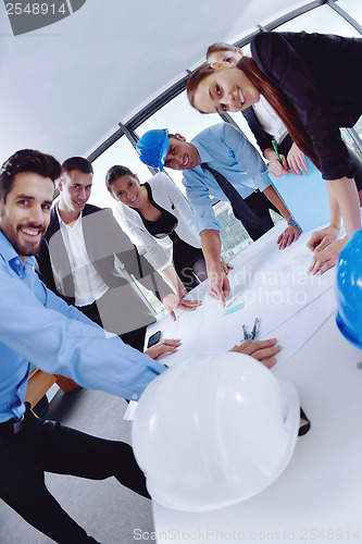 Image of business people group in a meeting at office