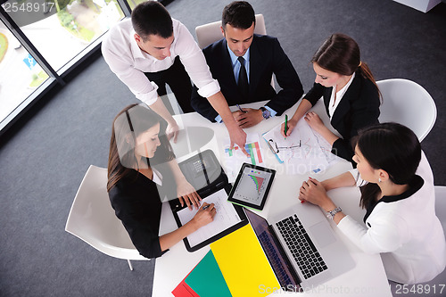 Image of business people group in a meeting at office