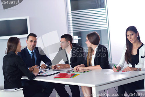 Image of business people group in a meeting at office