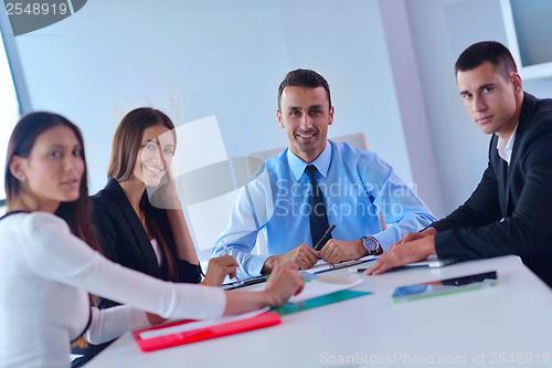 Image of business people group in a meeting at office