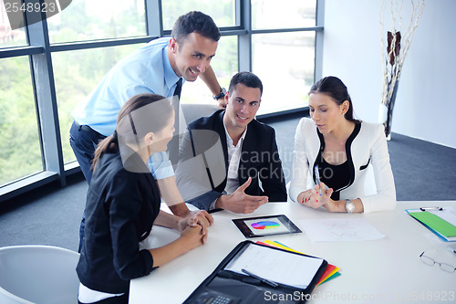 Image of business people group in a meeting at office