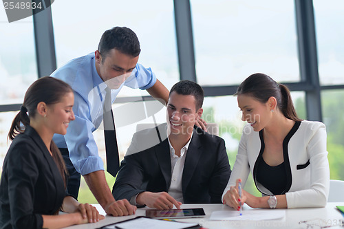 Image of business people group in a meeting at office