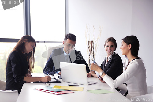 Image of business people group in a meeting at office