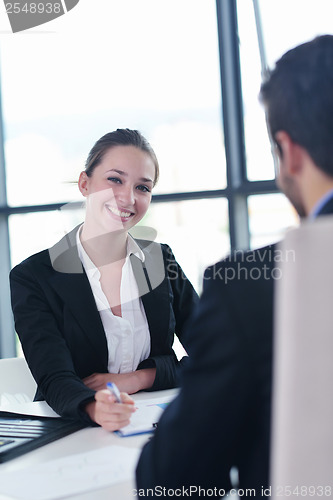 Image of business people group in a meeting at office