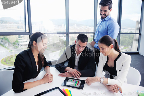 Image of business people group in a meeting at office