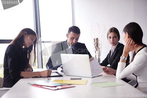 Image of business people group in a meeting at office