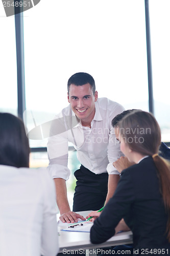 Image of business people group in a meeting at office