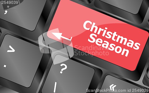 Image of Computer keyboard key with christmas season words