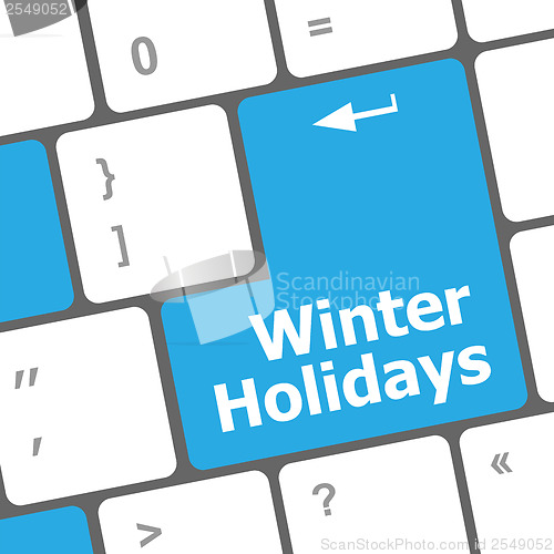 Image of Computer keyboard key with winter holidays words