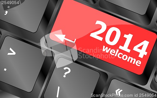 Image of New year concept: welcome 2014 key on the computer keyboard