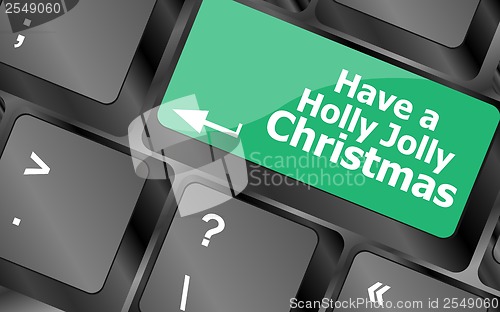 Image of Computer keyboard key with have a holly jolly christmas words