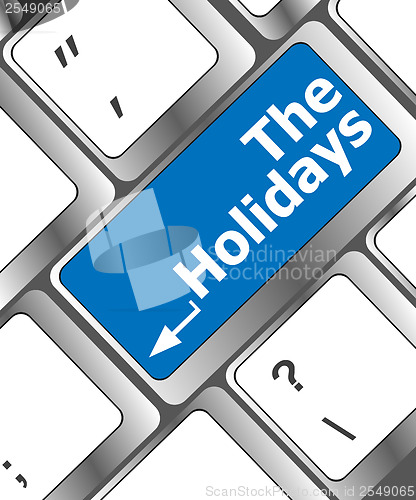 Image of the holidays button on modern internet computer keyboard key